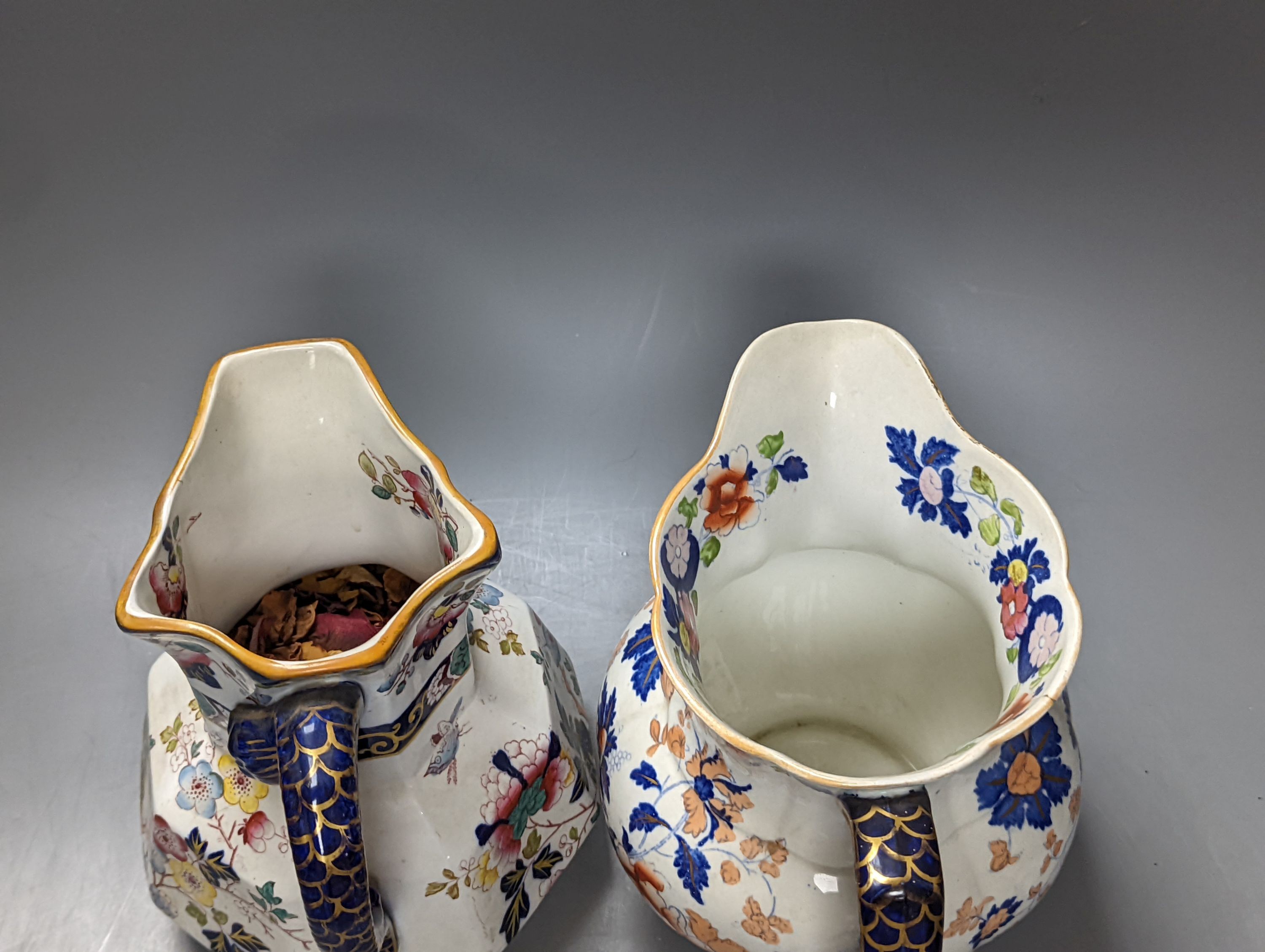 Two Masons jugs, with snake handles, tallest 19 cms high.